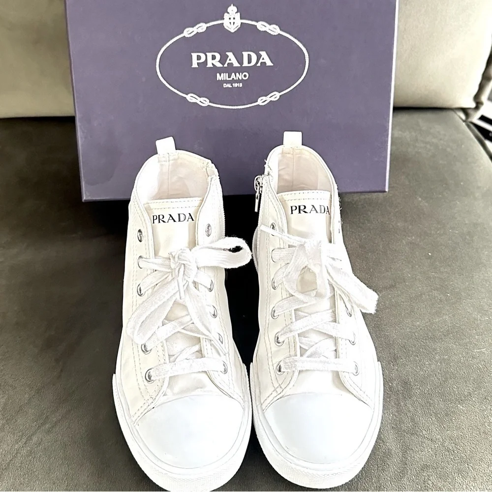 PRADA all white leather high top sneakers size 34 with original box on real real